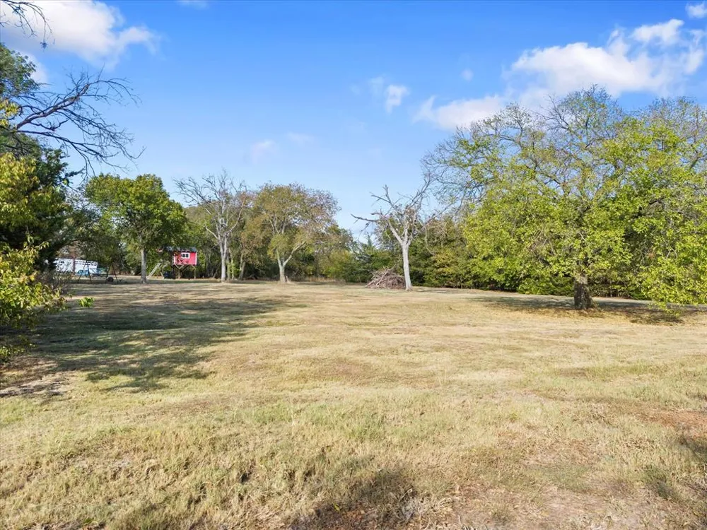 E Cherry Tree Lane Fate, TX 75087