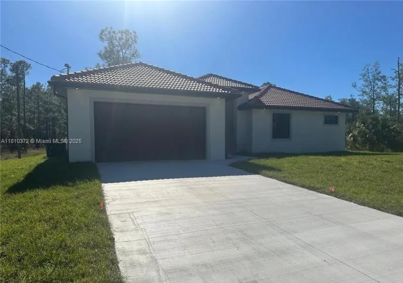 2002 E 13th St Lehigh Acres, FL 33972