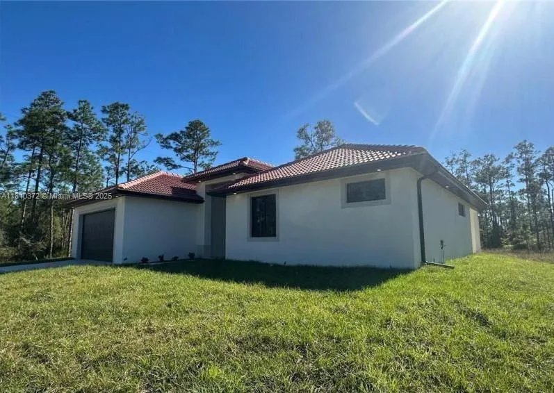 2002 E 13th St Lehigh Acres, FL 33972