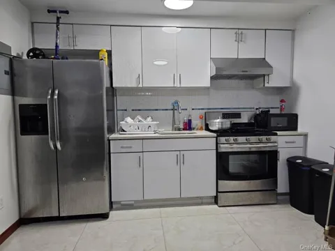108-38 41 AVENUE #1A & BSMT
