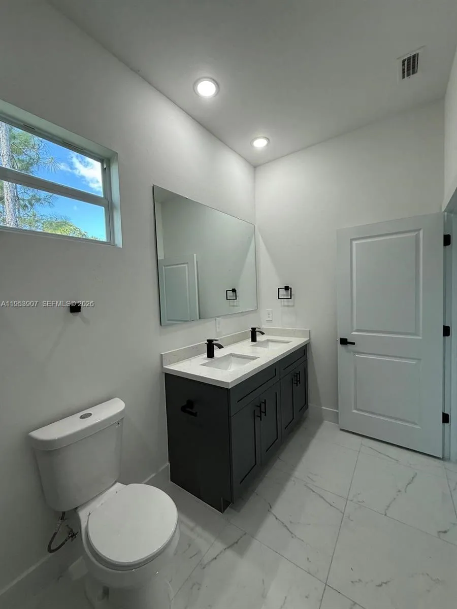 1121 FLORENCE ST E Lehigh Acres, FL 33974