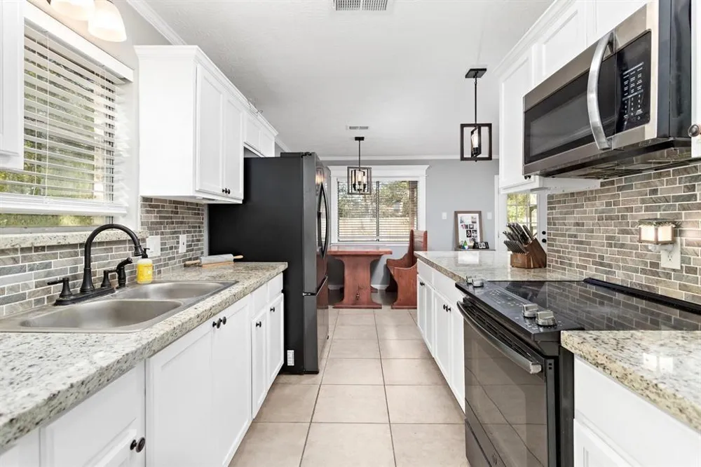 1845 King Arthur Court Pinehurst, TX 77630
