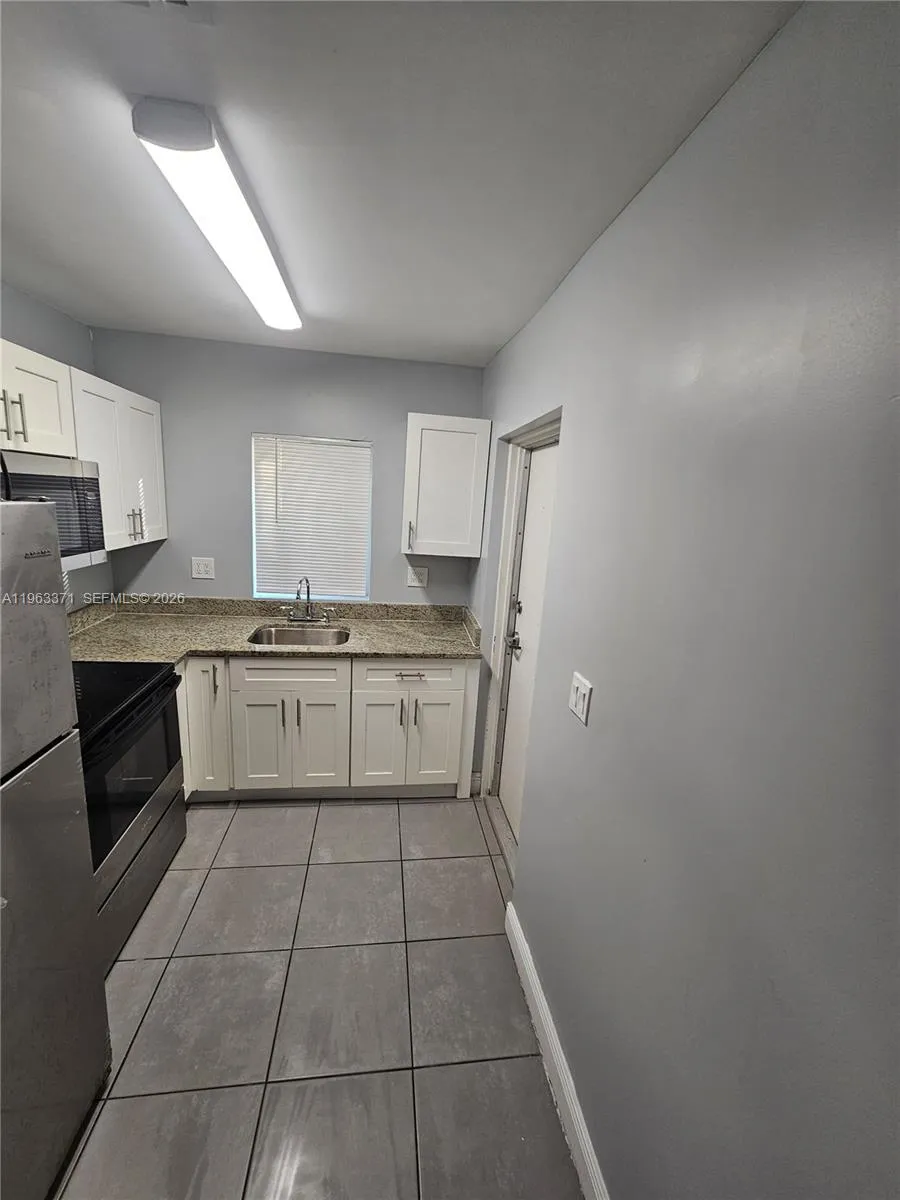1128 NW 101st St Miami, FL 33150