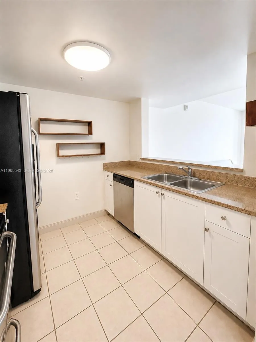 60 NW 37th Ave #1205 Miami, FL 33125