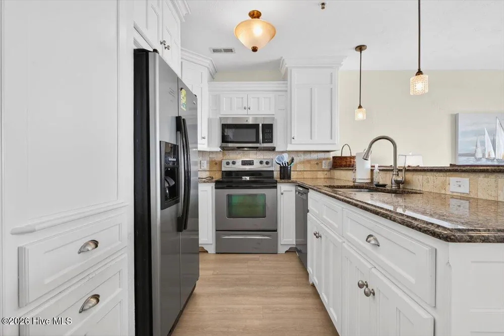 27 Ocean Isle West Boulevard ## 1h Ocean Isle Beach, NC 28469