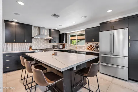 7702 De Soto Avenue