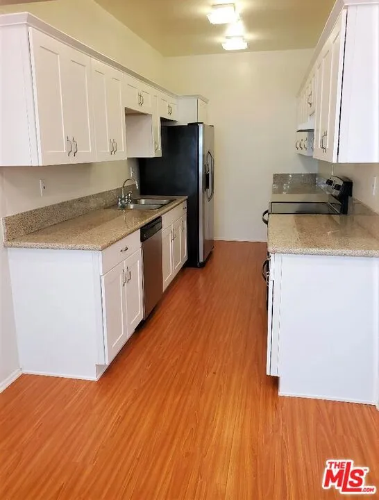 435 PALM DRIVE #202 Beverly Hills, CA 90210