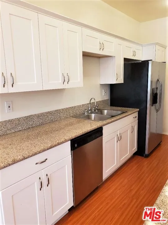 435 PALM DRIVE #202 Beverly Hills, CA 90210