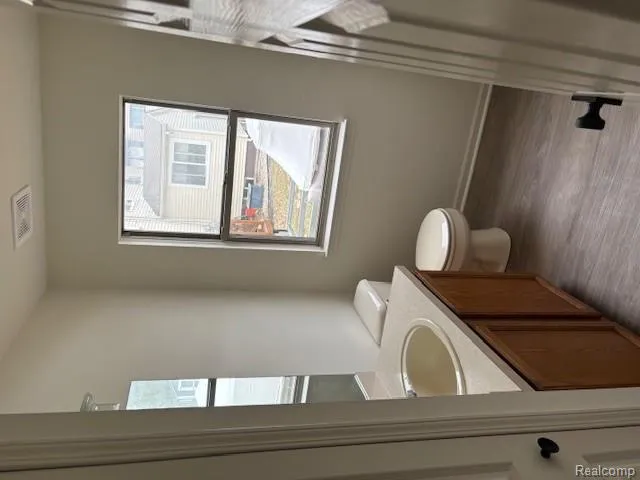 210 Rosebud Street Walled Lake City, MI 48390