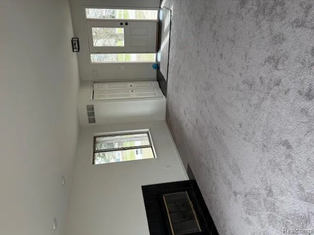 210 Rosebud Street Walled Lake City, MI 48390