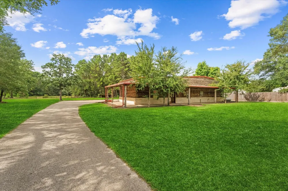 9250 County Road 302 Plantersville, TX 77363