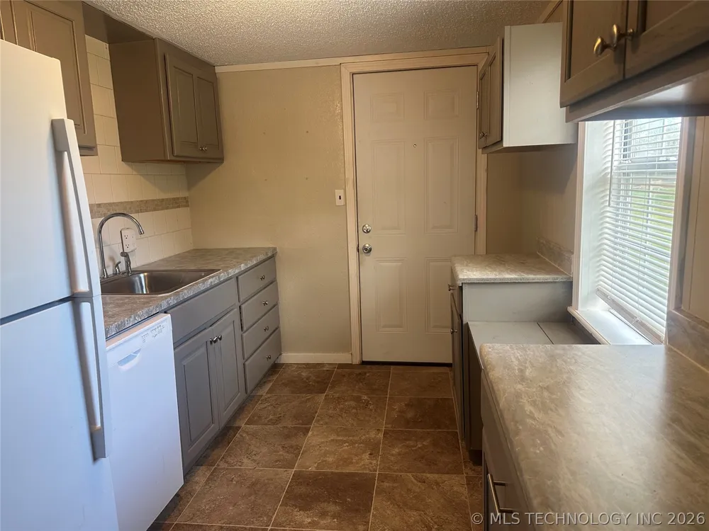 1106 Sherman Avenue Okmulgee, OK 74447