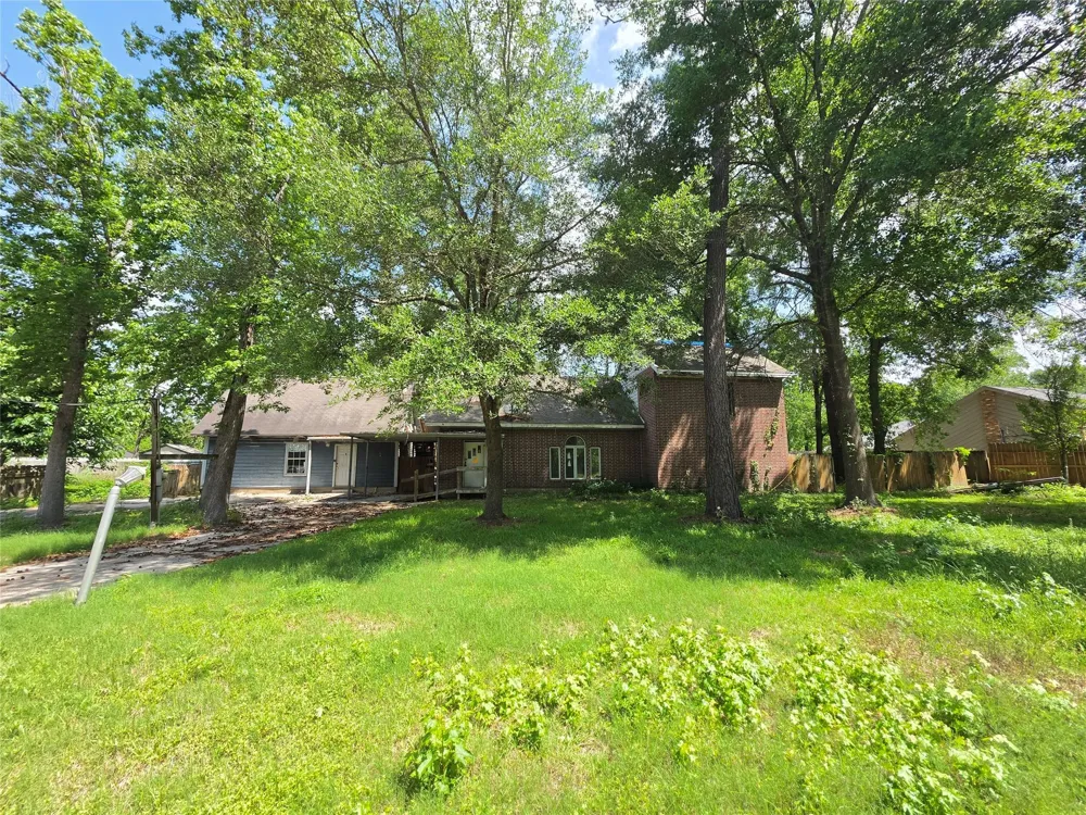 12222 Oak Hollow Lane Pinehurst, TX 77362