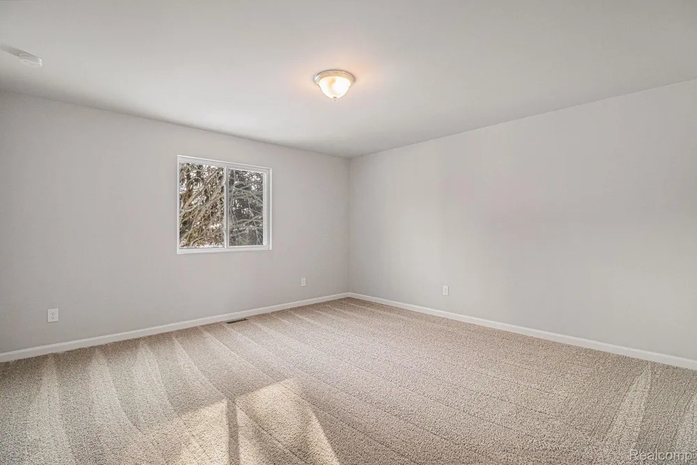3163 Wild Orchid Lane Burton City, MI 48519