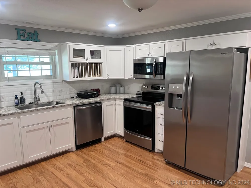 203 NE H STREET Stigler, OK 74462