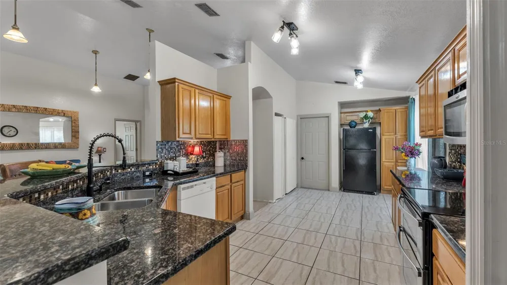 13409 SWEET HILL ROAD Polk City, FL 33868