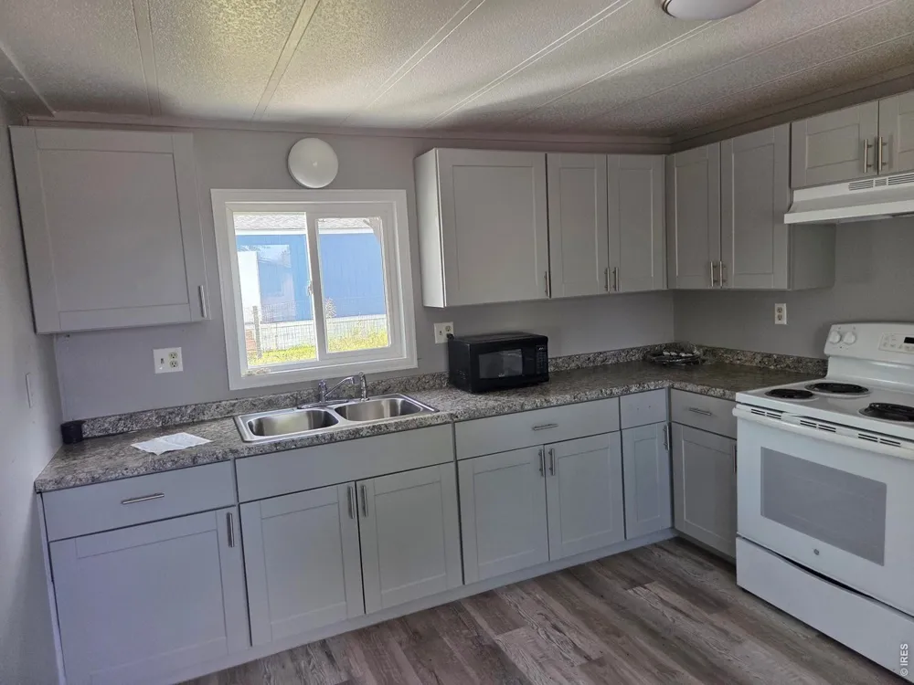 101 Larch Drive Log Lane Village, CO 80705