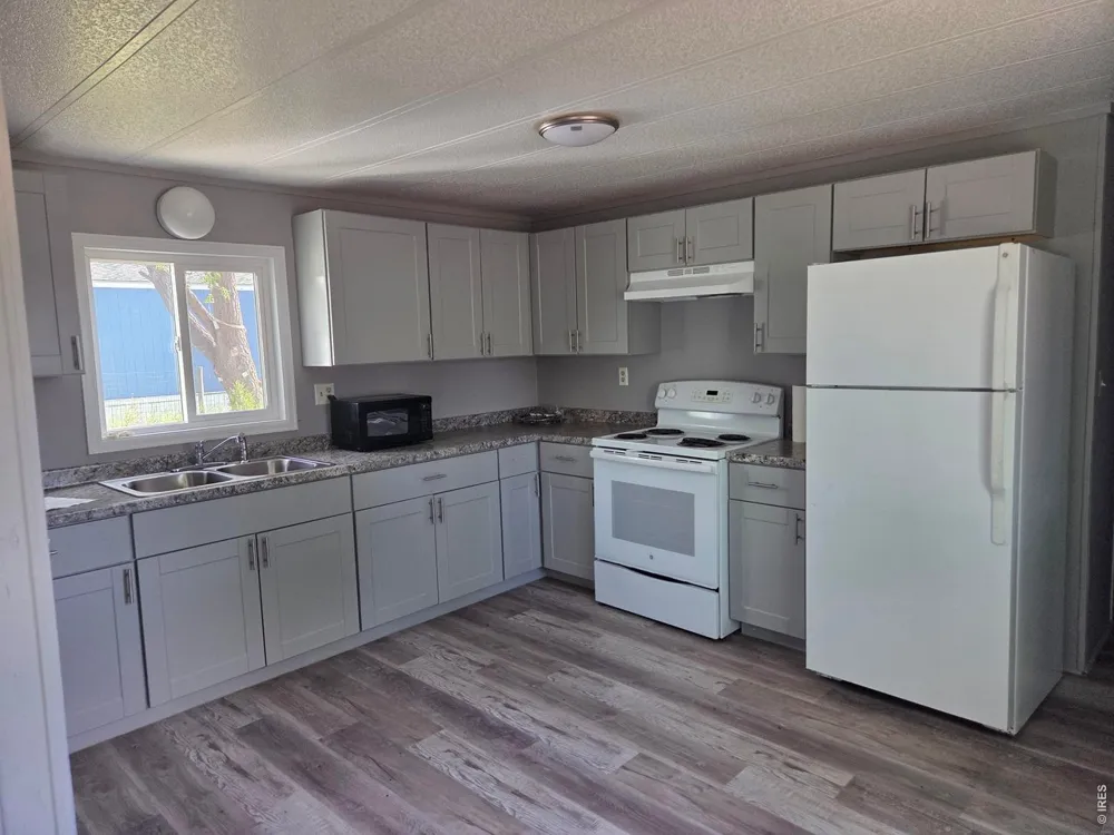 101 Larch Drive Log Lane Village, CO 80705