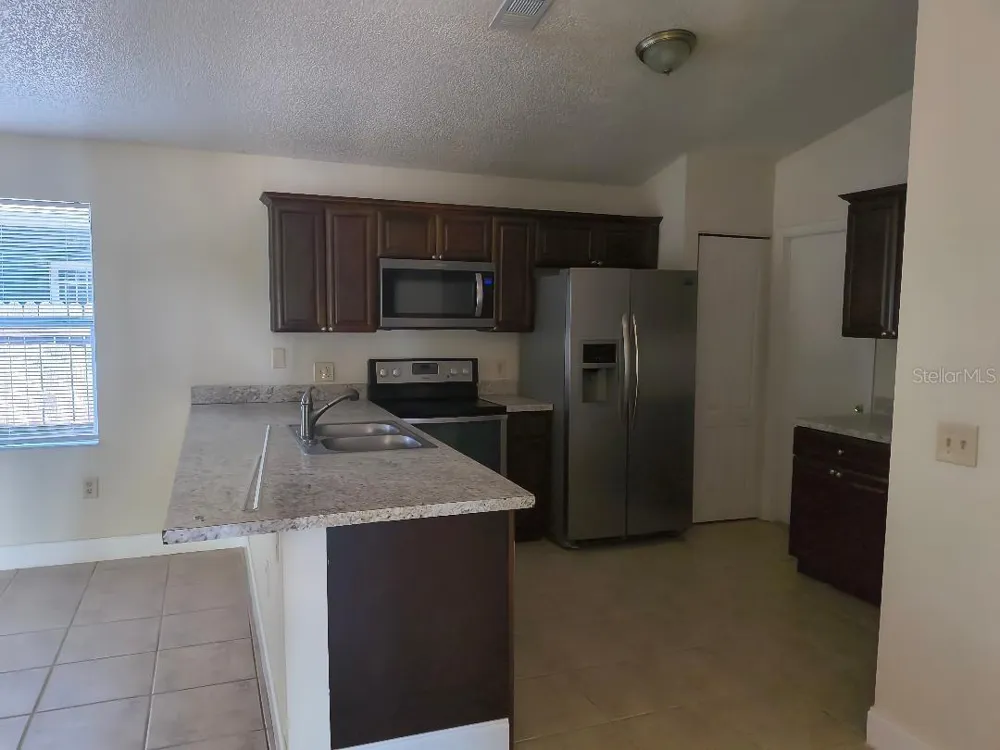 1003 WINTERBERRY LANE Orlando, FL 32811