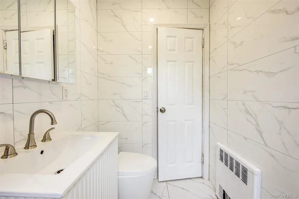 164-38 76th Road Fresh Meadows, NY 11366