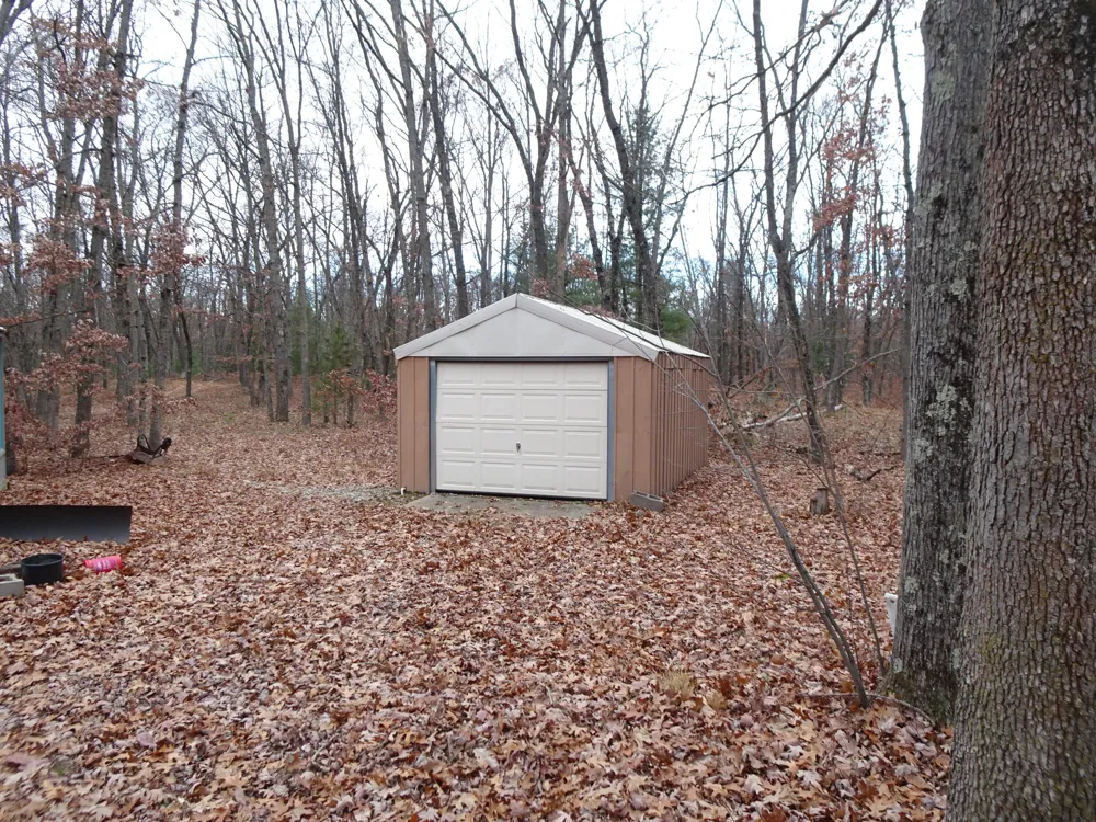 1035 Udell Hills Fire Tower Road Stronach Township, MI 49660