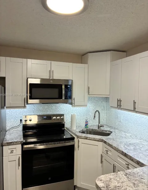 117 NE 5TH ST NE #113