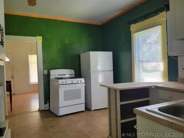 1000 6th Quinton, OK 74561