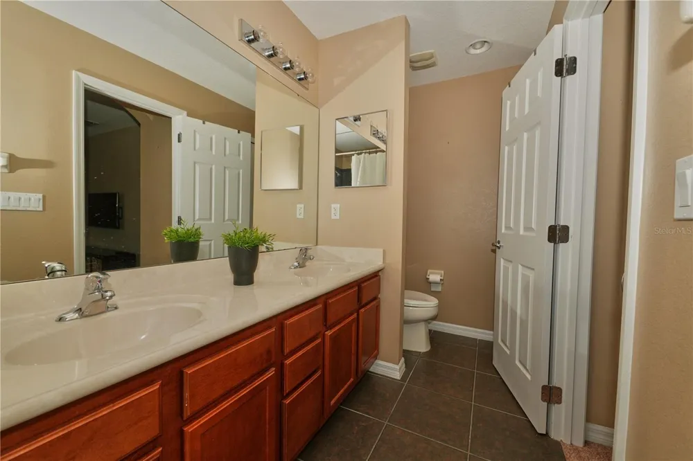 9135 CARDINAL MEADOW TRAIL Orlando, FL 32827