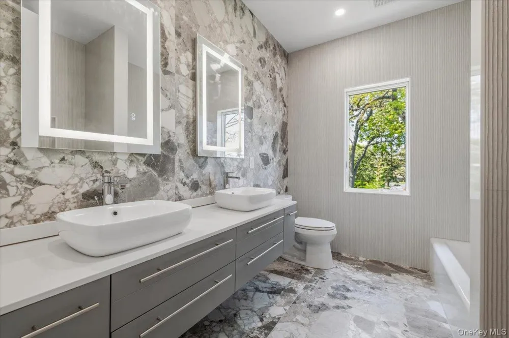 8 Sealy Drive Lawrence, NY 11559