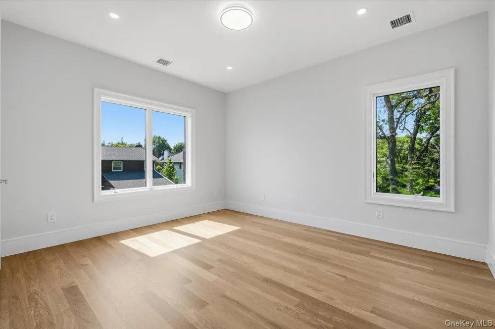 8 Sealy Drive Lawrence, NY 11559