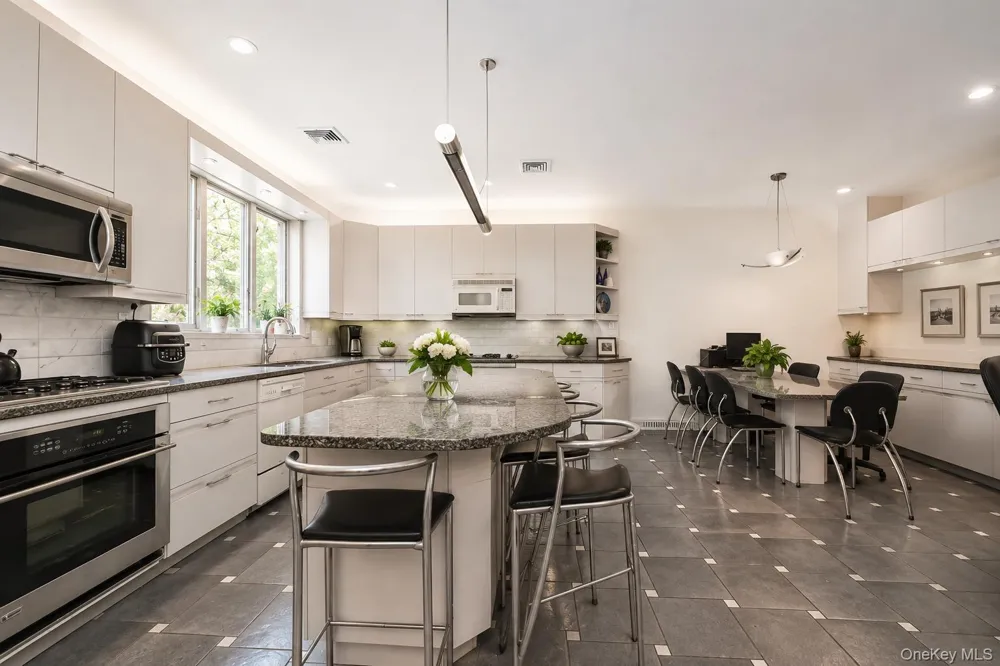 144-49 70th Avenue Kew Garden Hills, NY 11367
