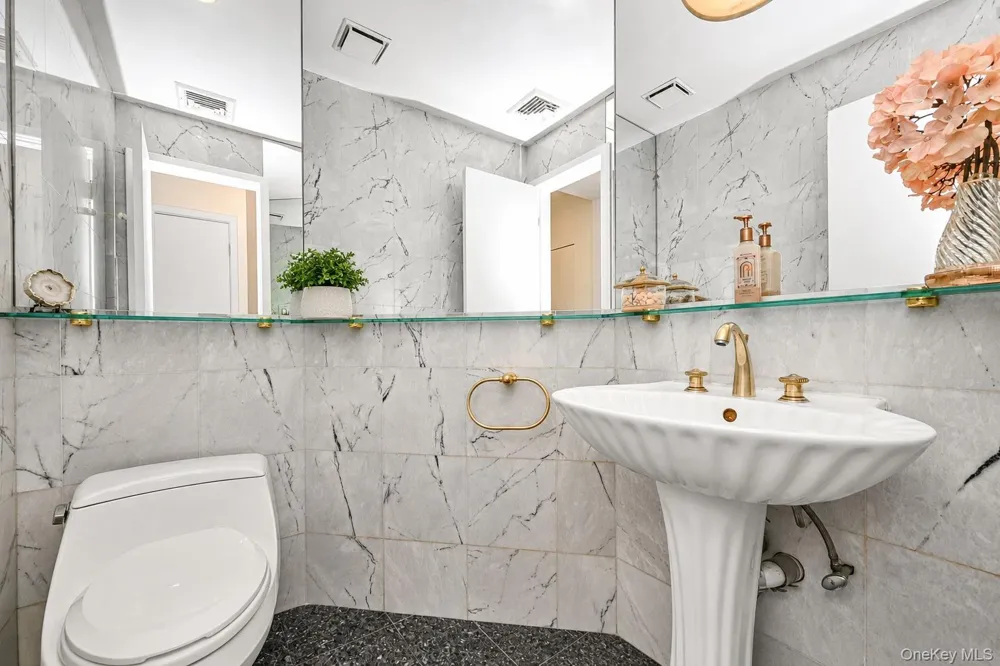 144-49 70th Avenue Kew Garden Hills, NY 11367