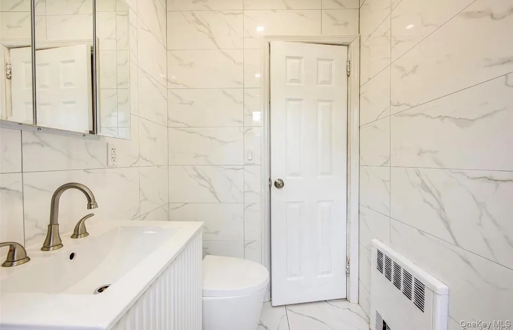 164-38 76th Road Fresh Meadows, NY 11366