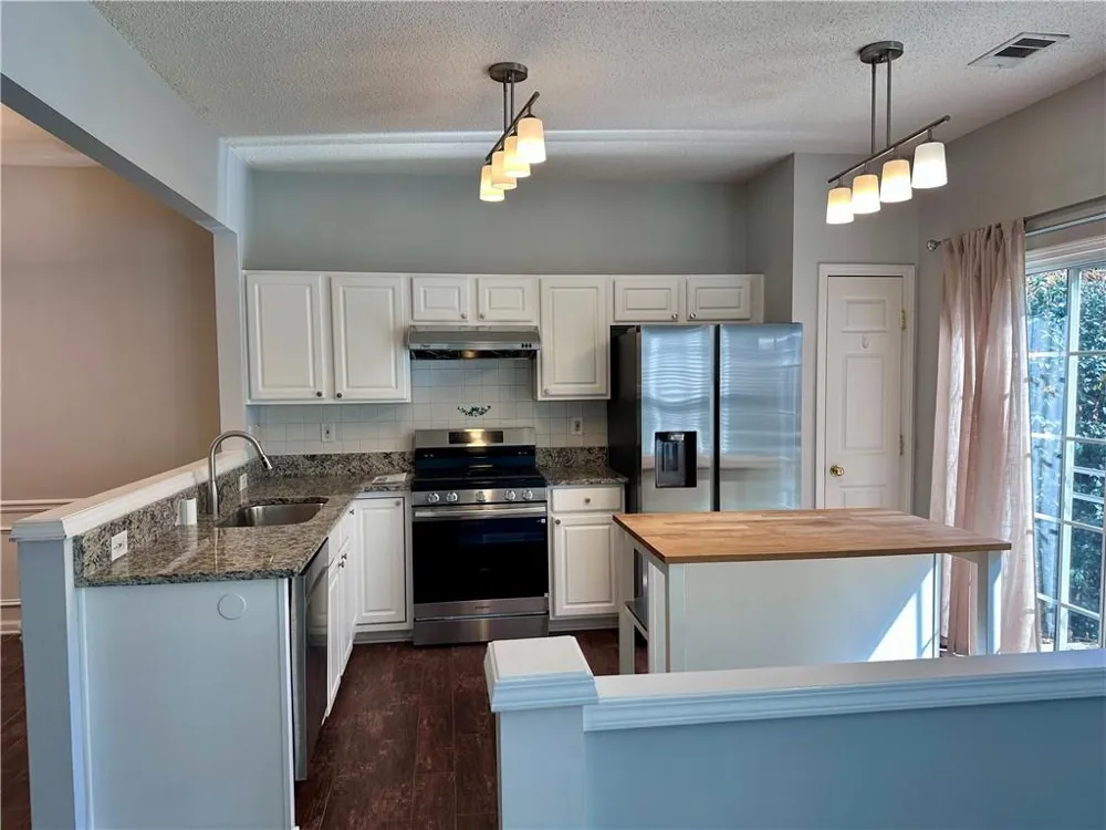 6004 Falling Water Court Roswell, GA 30076