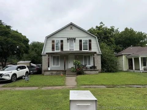 114 E 6th Street