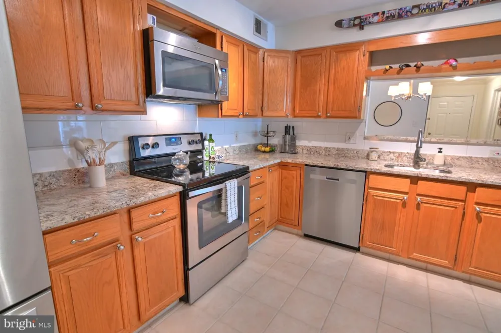 2220 SPRINGWOOD DRIVE #C Reston, VA 20191