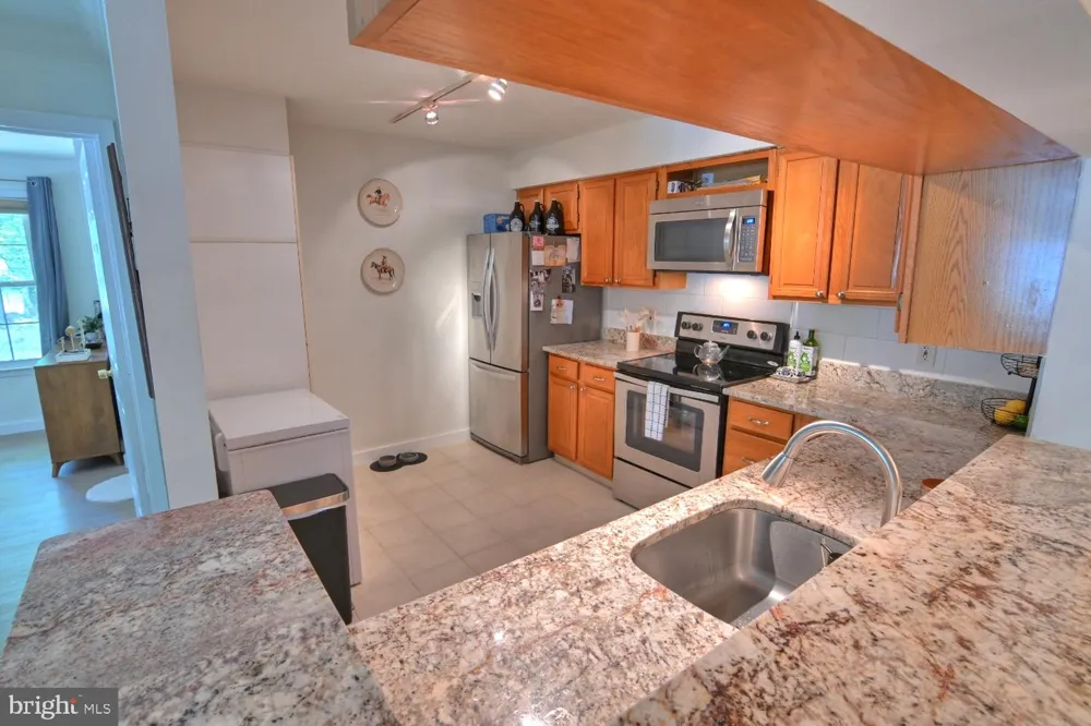 2220 SPRINGWOOD DRIVE #C Reston, VA 20191
