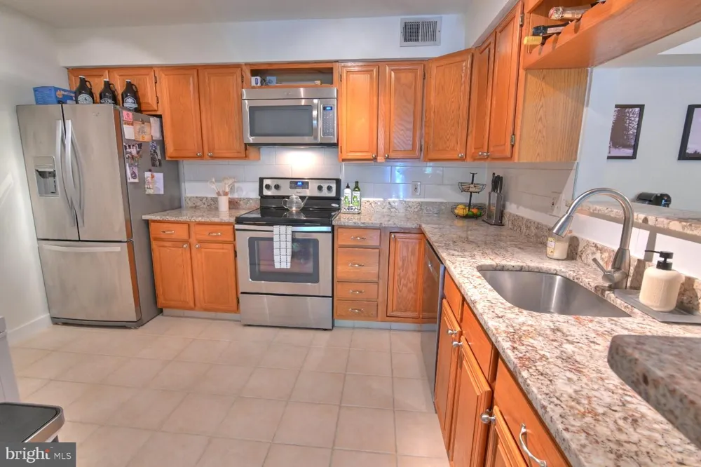 2220 SPRINGWOOD DRIVE #C Reston, VA 20191
