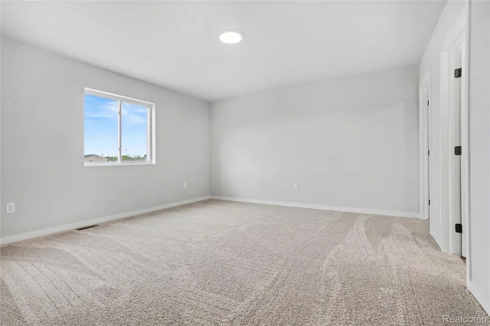 8033 Moonlight Creek Lane Handy Township, MI 48836