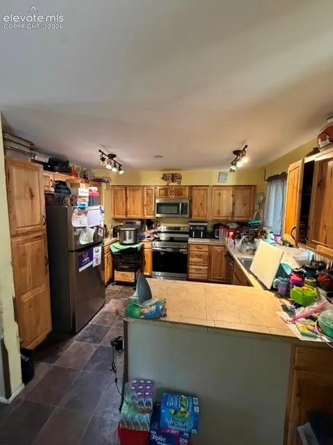 1106 Wooten Road Colorado Springs, CO 80915