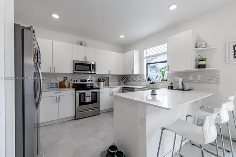 561 NW 204th St