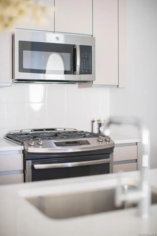 1 Third #1011 Mineola, NY 11501