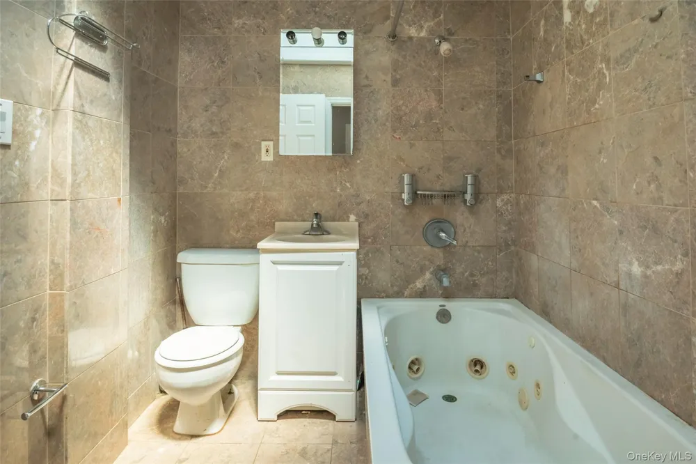 11205 103rd Avenue Richmond Hill, NY 11419