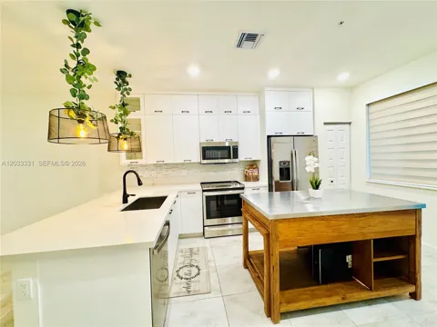 10295 NW 64th Ter #104