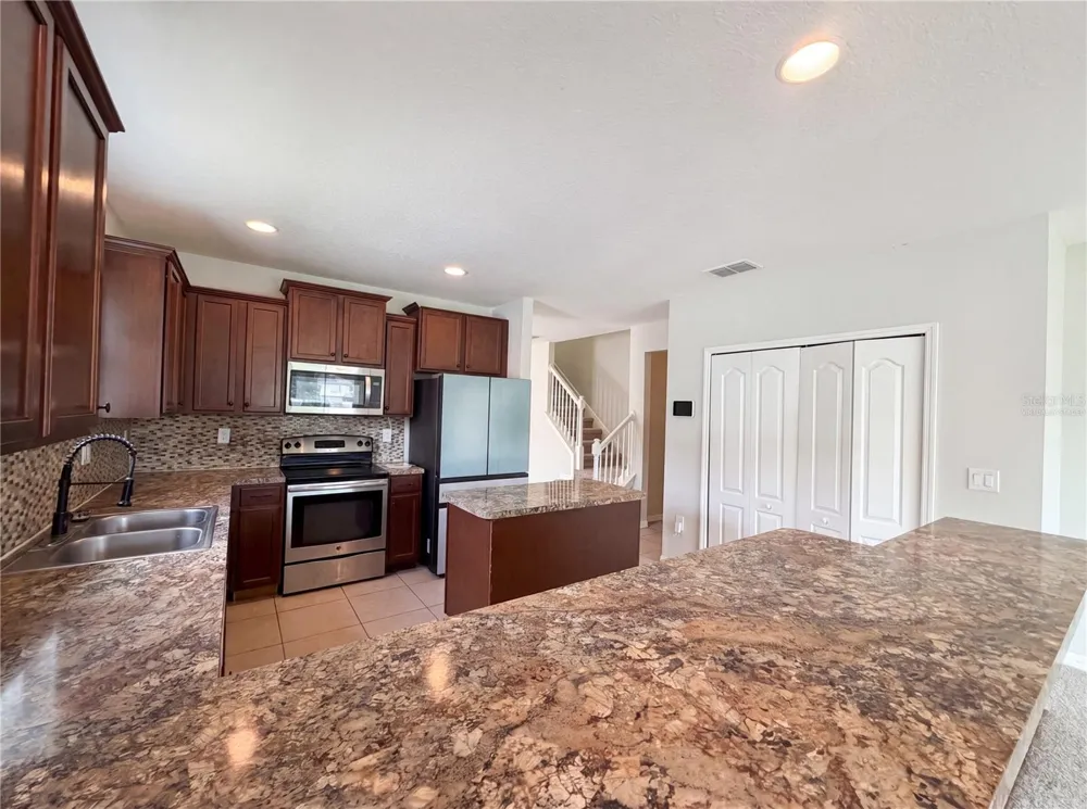 4876 GRASSY KNOLL DRIVE Tavares, FL 32778
