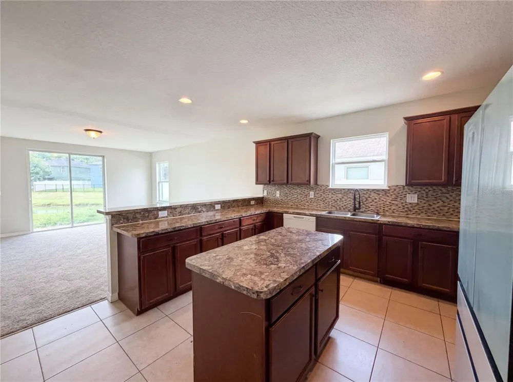 4876 GRASSY KNOLL DRIVE Tavares, FL 32778