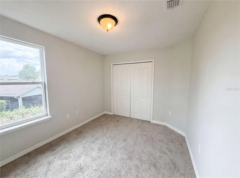 4876 GRASSY KNOLL DRIVE Tavares, FL 32778