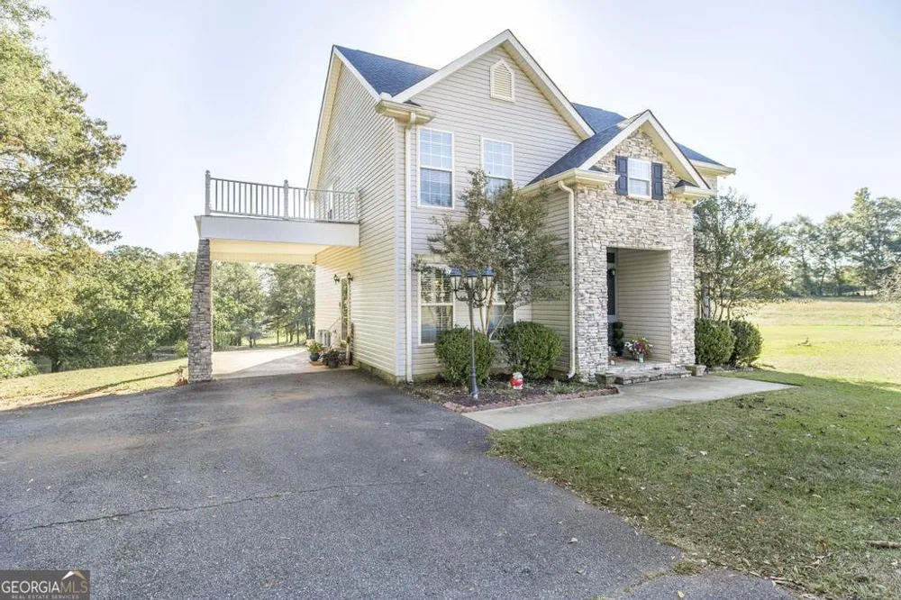 1550 Charlie Benson RD Forsyth, GA 31029