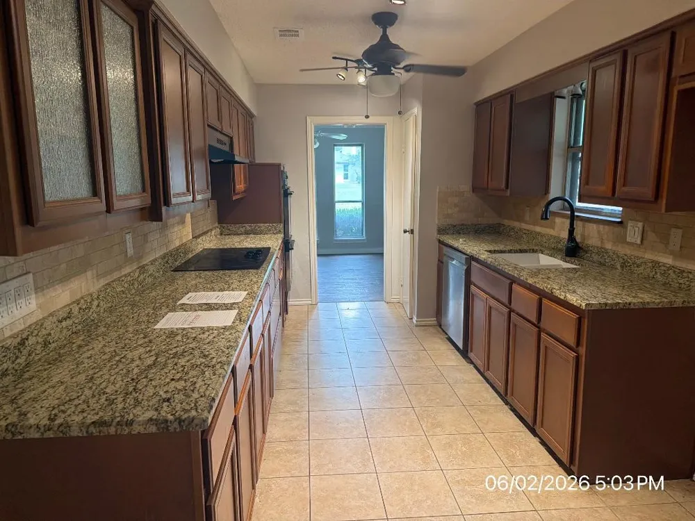 103 Red Bud Court Oak Leaf, TX 75154