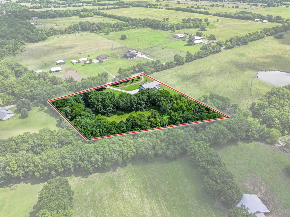 1673 County Road 1525 Ector, TX 75439